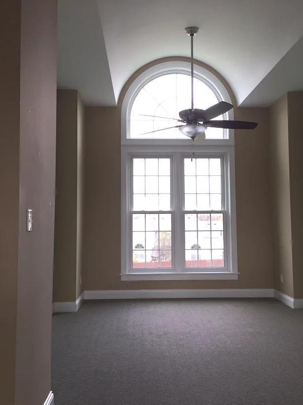 An interior view toward the clubhouse windows and doorway