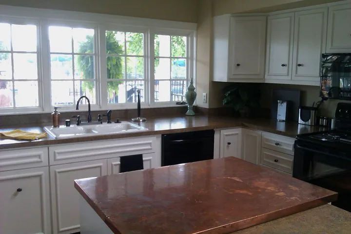 The kitchen viewed from the doorway, showing counter space and cabinets